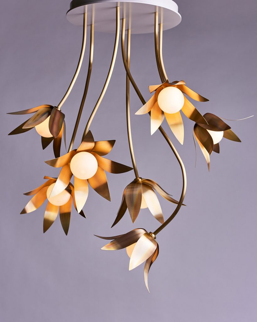 Floral chandelier with hand-blown glass globes and brass petals for a private residence. Manufactured by Karice.