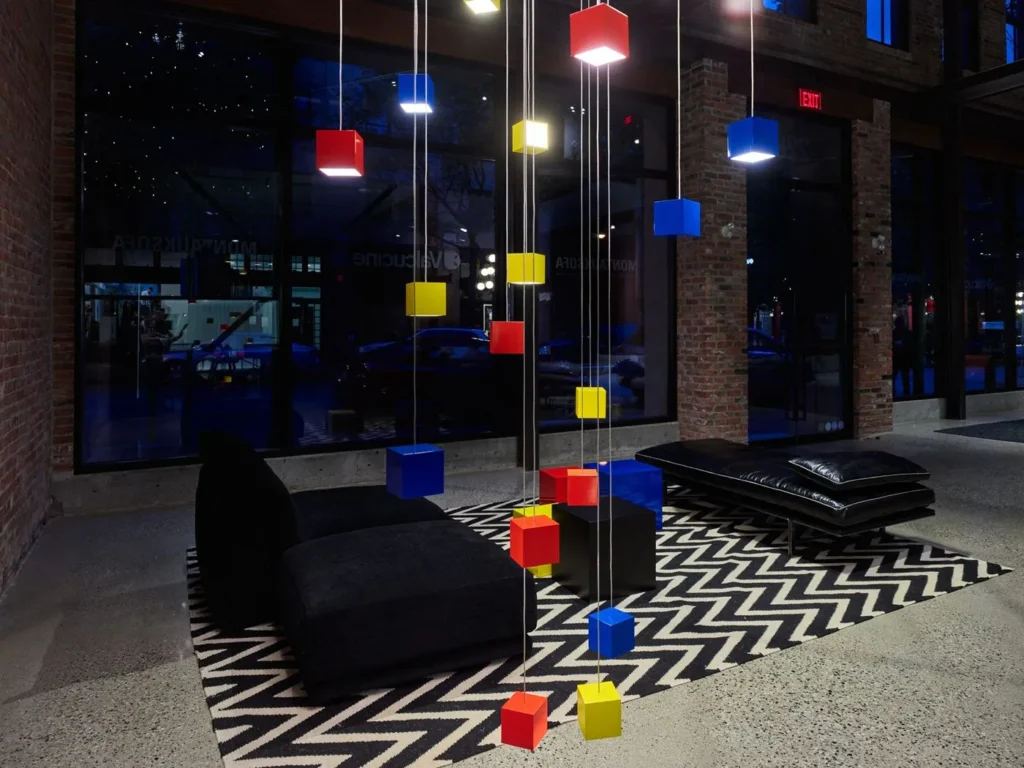 CUBE LED pendant light inspired by the Rubik’s Cube, featuring a compact 3-inch geometric form and colorful finish options. Designed and manufactured by Karice.
