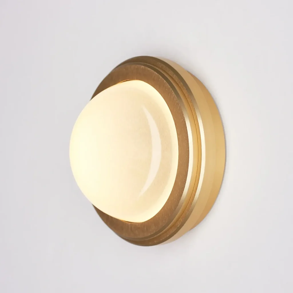 Infinity wall sconce, signature design by Karice.