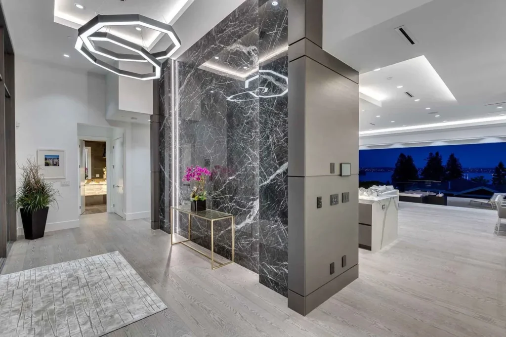 Linked Luxennea geometric LED chandelier with a nine-sided form. Designed and manufactured by Karice.