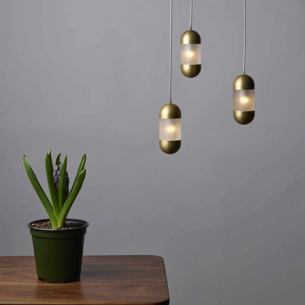 OLO LED pendant light with oval acrylic diffuser. Designed and manufactured by Karice.
