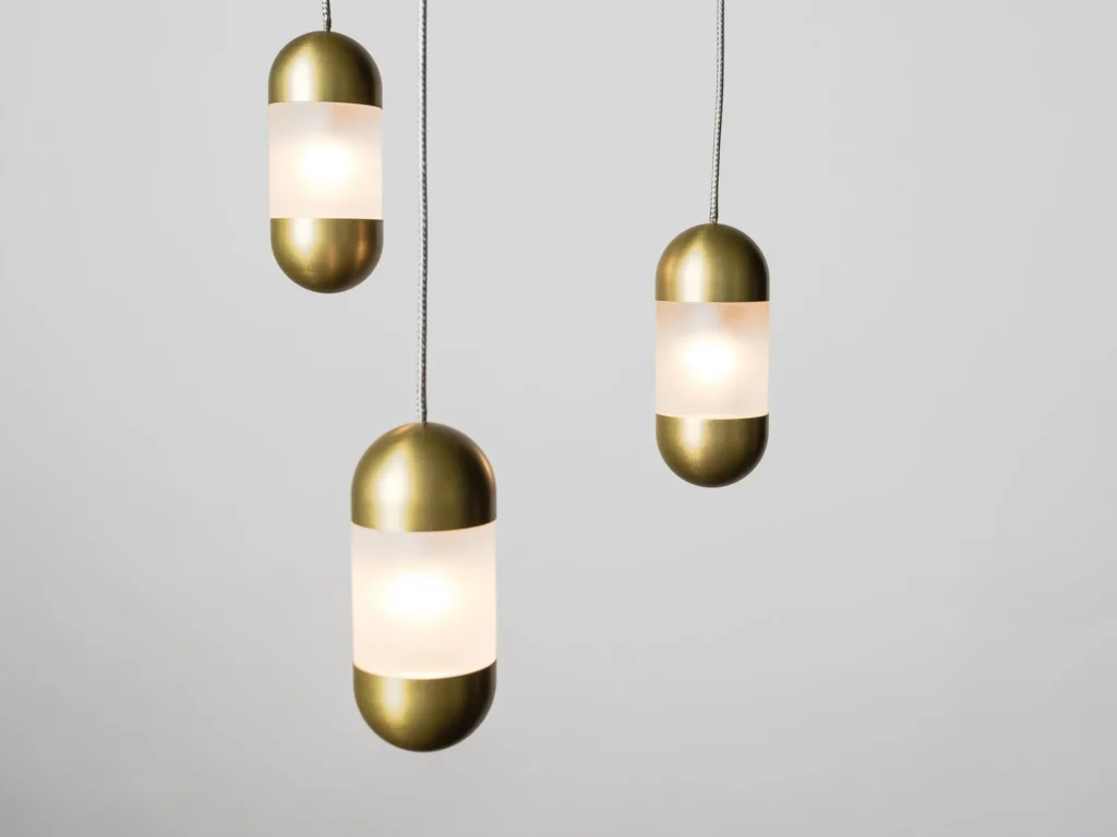 OLO LED pendant light with oval acrylic diffuser. Designed and manufactured by Karice.