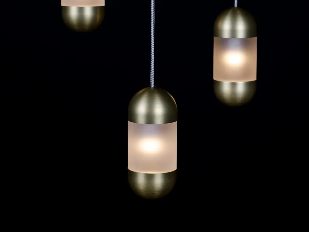 OLO LED pendant light with oval acrylic diffuser. Designed and manufactured by Karice.
