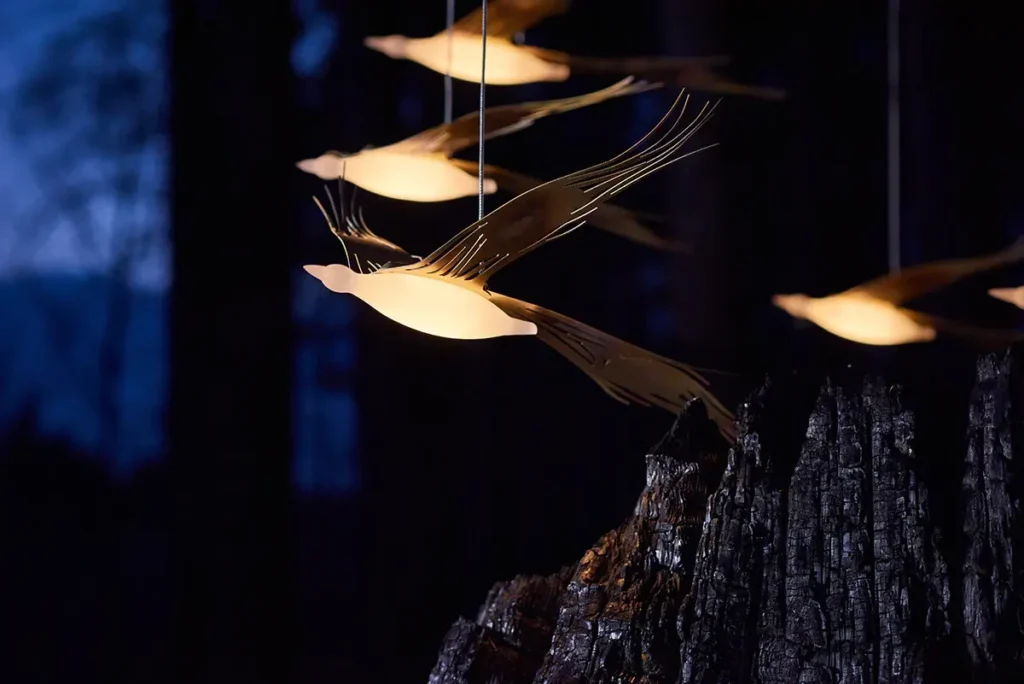 Phoenix pendant lighting by Karice. Inspired by the mythological Phoenix bird, handcrafted using genuine brass, and suspended from a simple coaxial cable.