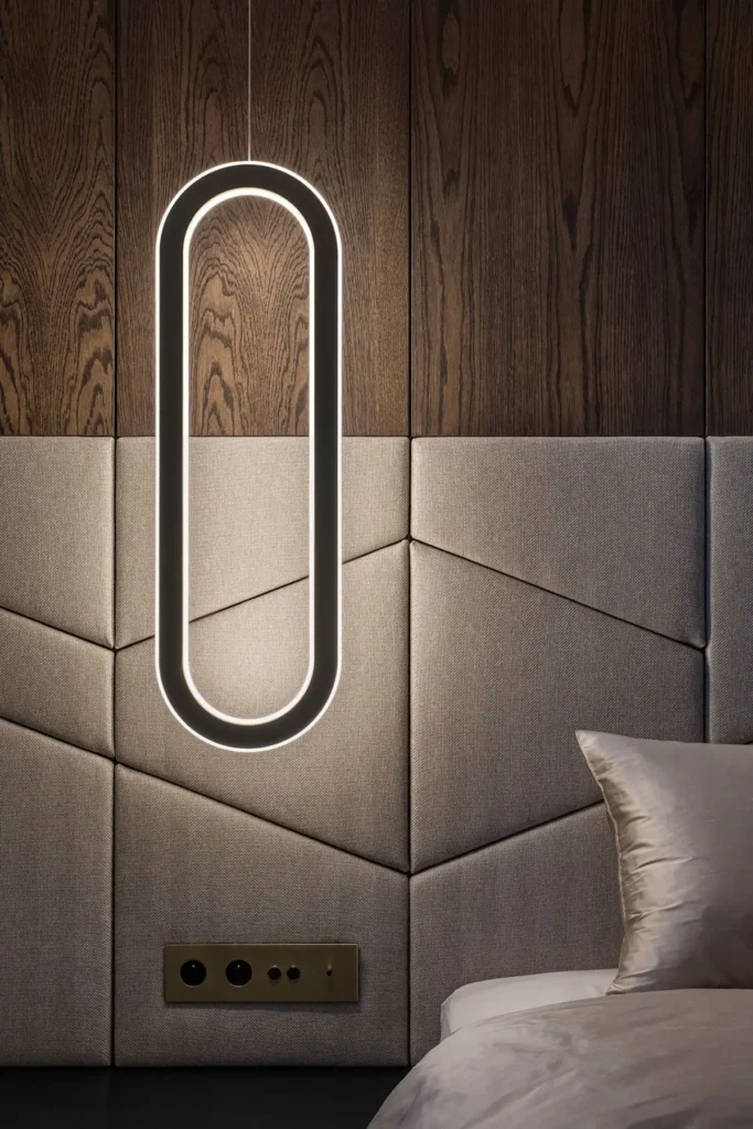 Proton LED pendant lighting fixture by Karice. Suspended oval-shaped ring made with aluminum and acrylic, with hidden fasteners and wiring.