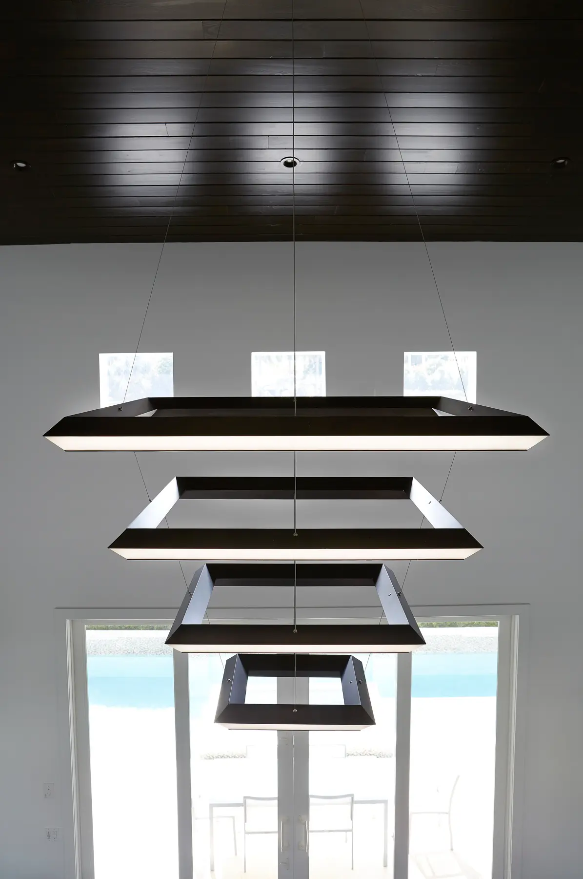 Large four-tier square chandelier for a private residence in Florida. Manufactured and installed by Karice.