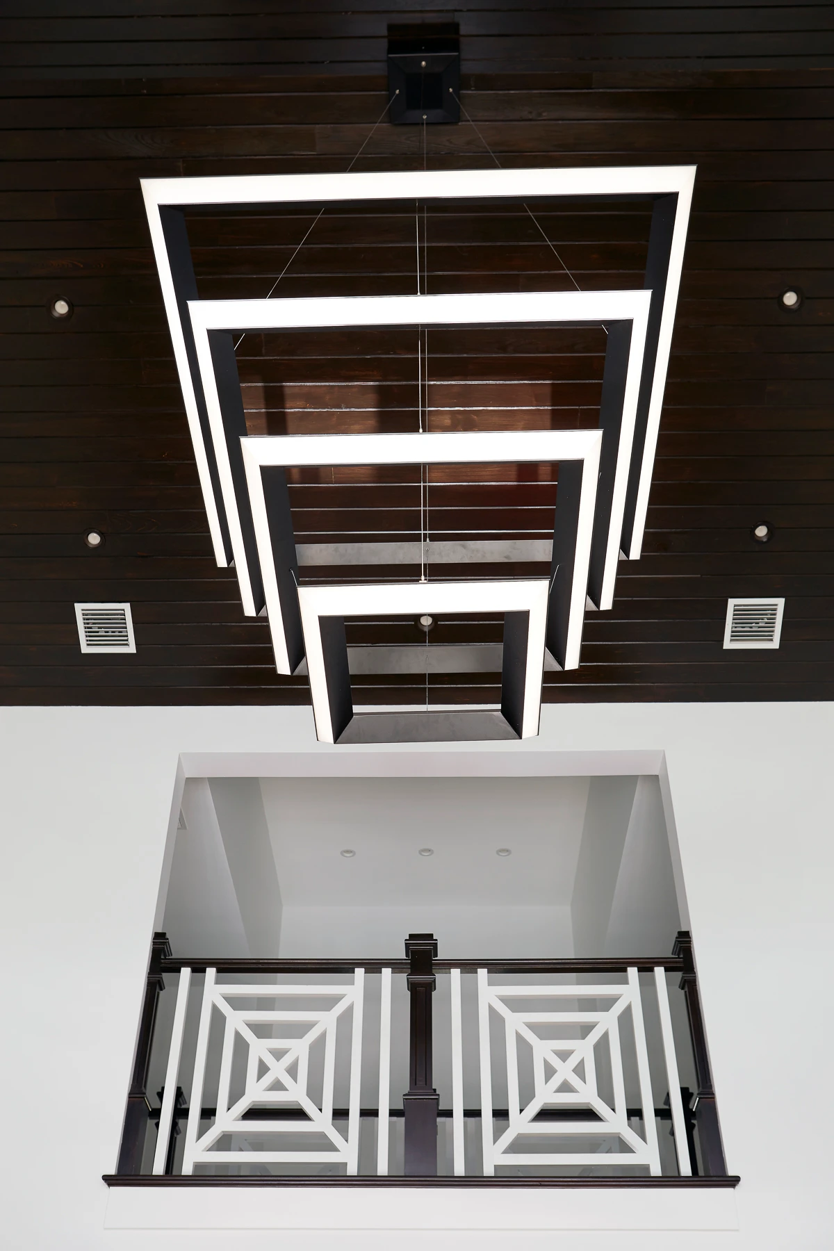 Large four-tier square chandelier for a private residence in Florida. Manufactured and installed by Karice.