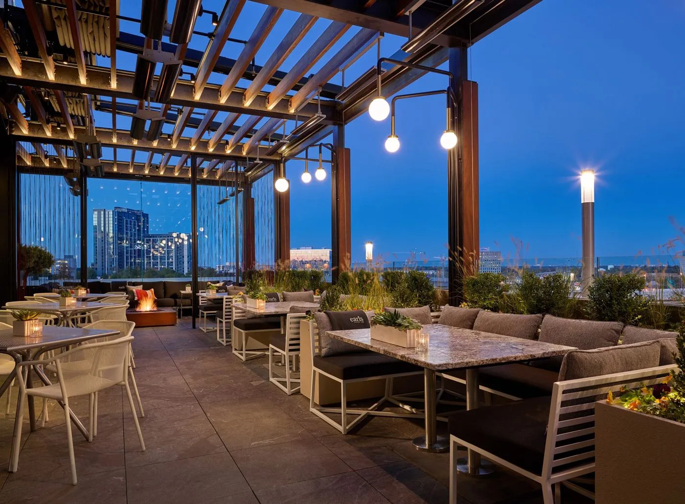 Restaurant patio lighting for Earls Kitchen and Bar in Tysons One Palace, McLean, VA, USA. Manufactured by Karice.