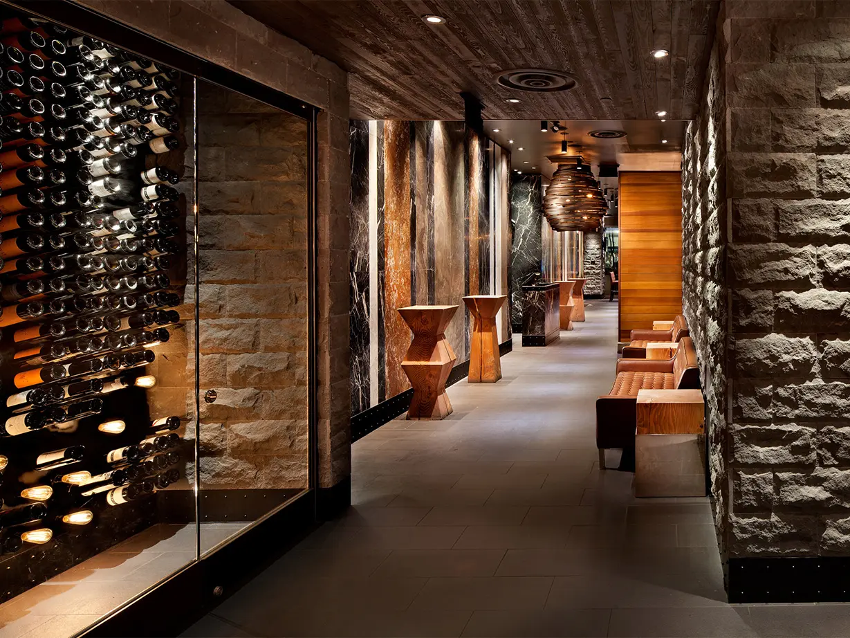 Decorative honeycomb pendant light and custom wine wall for Earls Kitchen and Bar in King Street, Toronto, ON, CA. Manufactured by Karice.