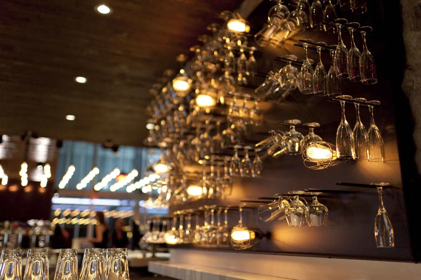 Custom wine holder for Earls Kitchen and Bar in King Street, Toronto, ON, CA. Fabricated by Karice.