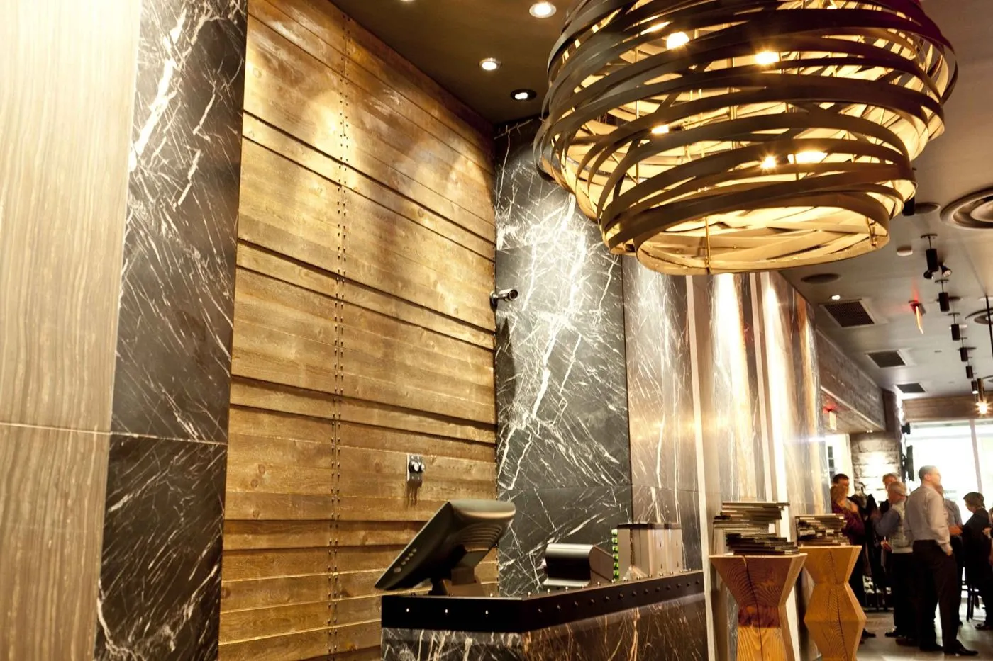 Custom honeycomb pendant lighting for Earls Kitchen and Bar in King Street, Toronto, ON, CA. Manufactured by Karice.