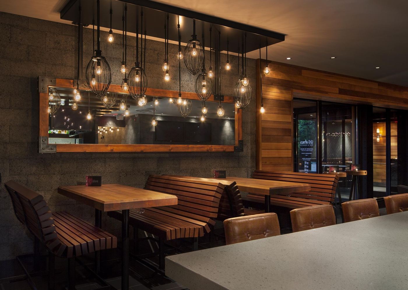 Custom mixed cluster pendant chandelier for Earls Kitchen & Bar in Wellington, London, ON, CA. Manufactured by Karice.