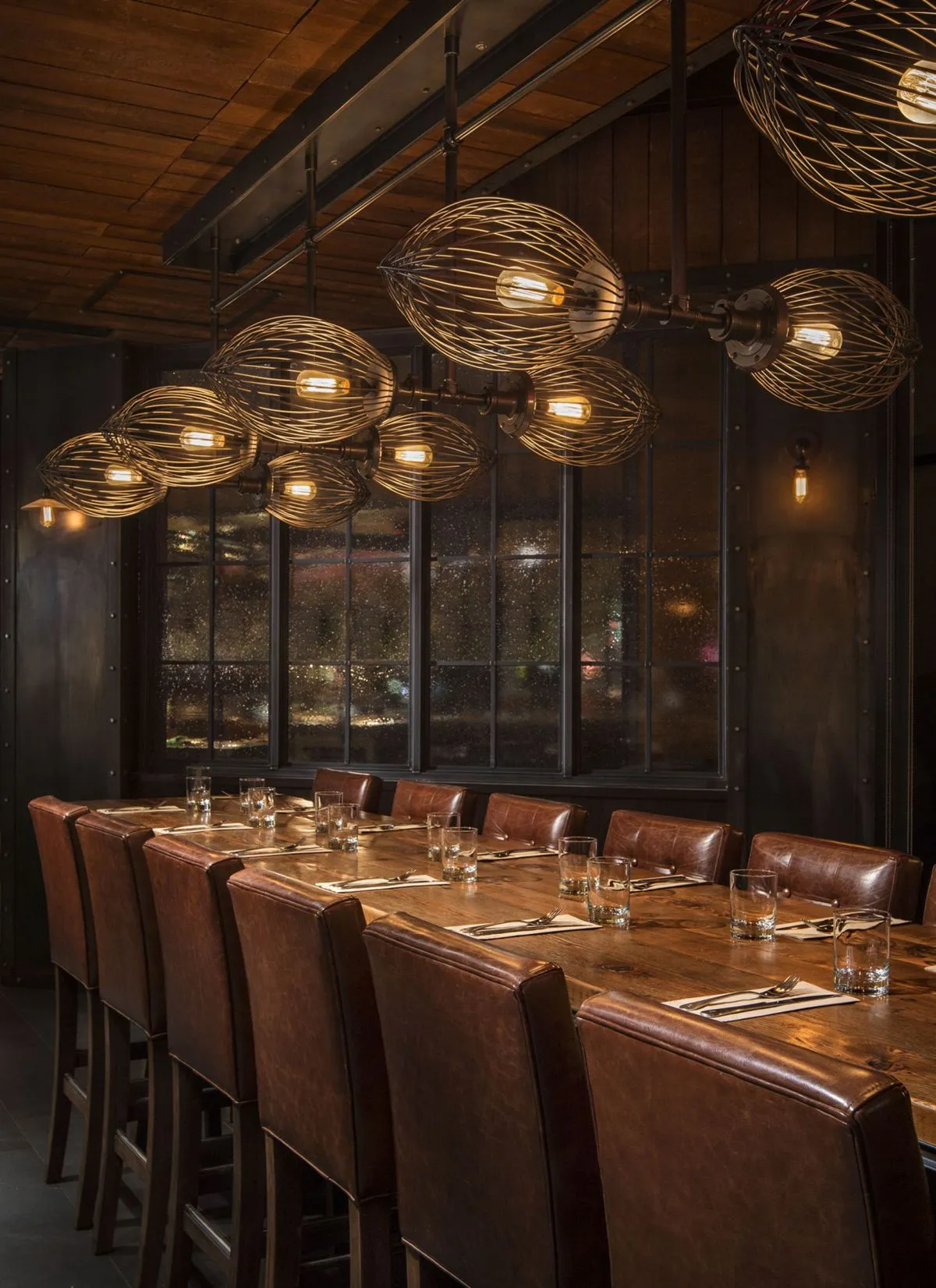 Custom whisk bar pendant lighting for Earls Kitchen and Bar in Jasper Avenue, Edmonton, AB, CA. Manufactured by Karice.