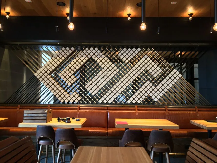 Lattice wall art installation for Earls Kitchen and Bar in Dadeland, Miami, FL, USA. Fabricated by Karice.