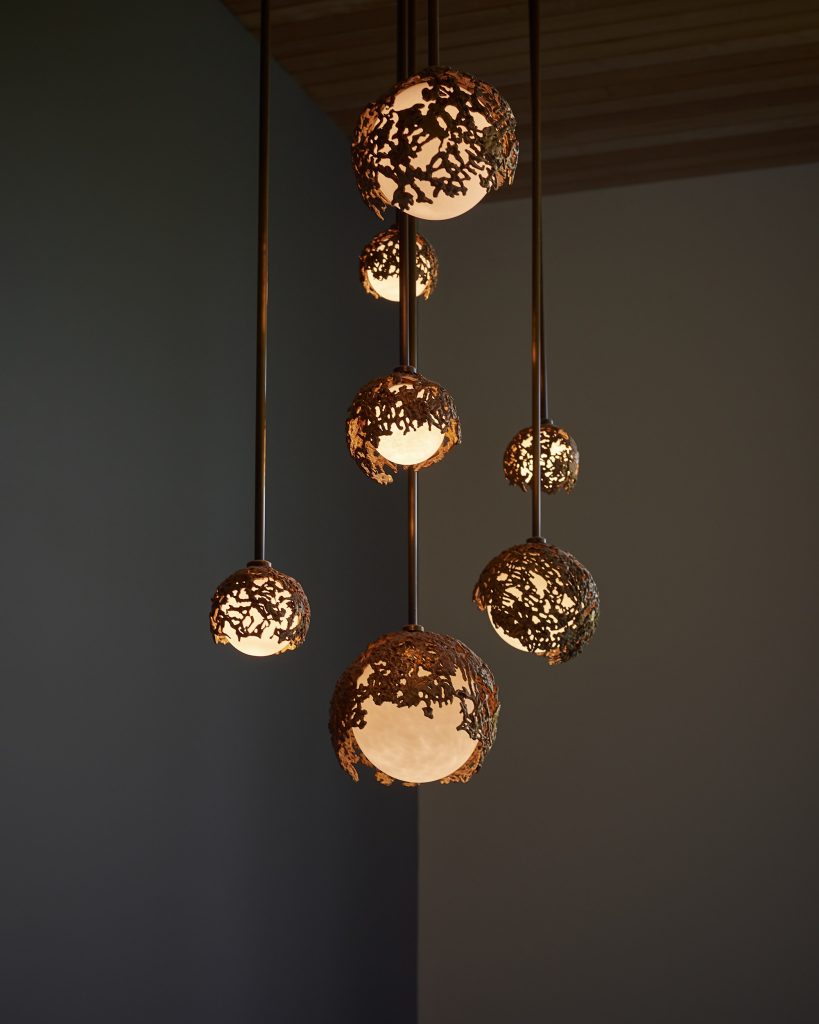 Clustered sculptural globe pendant chandelier for a private residence. Manufactured by Karice in collaboration with artist Marie Khouri.