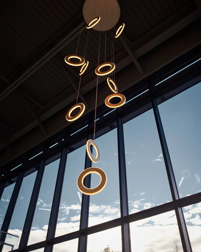 Multi-pendant chandeliers for a Corporate Head Office. Manufactured by Karice.