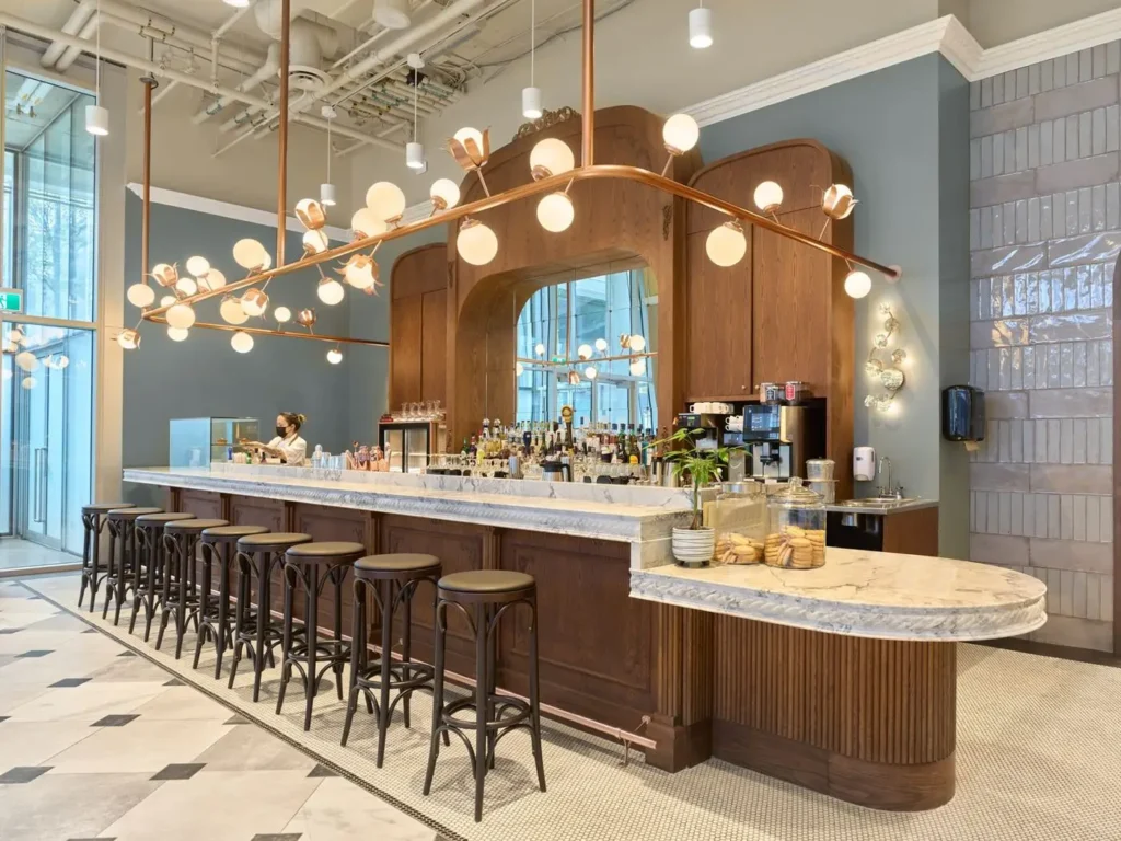 Decorative floral chandelier lighting for Linh Cafe in Vancouver, BC, CA by Karice.