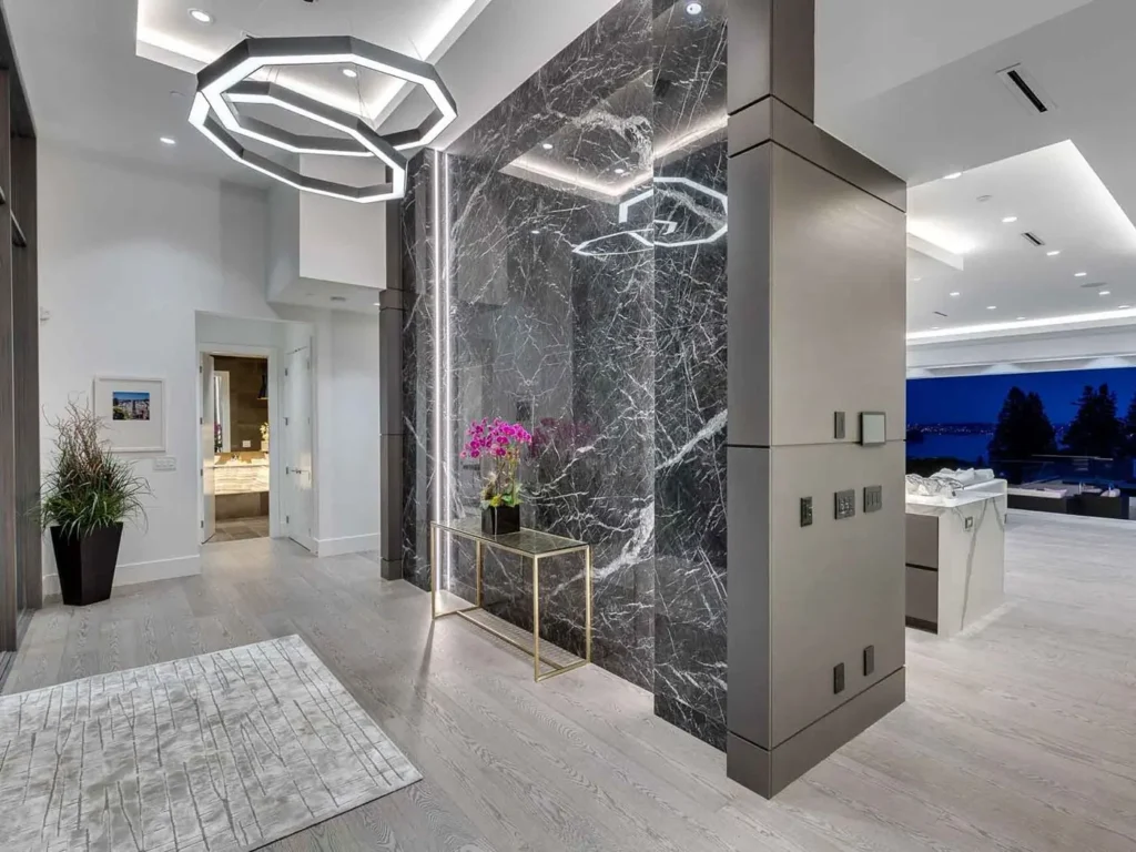 Linked geometric chandelier for a private residence. Manufactured and installed by Karice.