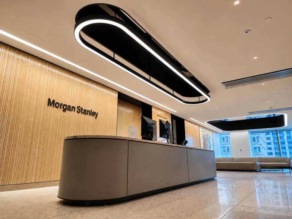 Custom oval linear ceiling lighting for Morgan Stanley in Boston, MA, USA. Manufactured by Karice.
