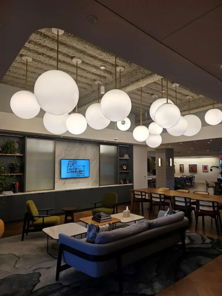 Custom glass globe pendant lighting for Sanofi in Bridgewater, NJ, USA. Manufactured by Karice Lighting.