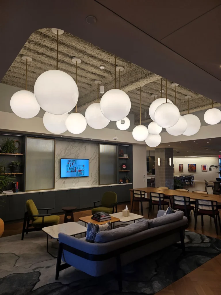 Custom glass globe pendant lighting for Sanofi in Bridgewater, NJ, USA. Manufactured by Karice Lighting.