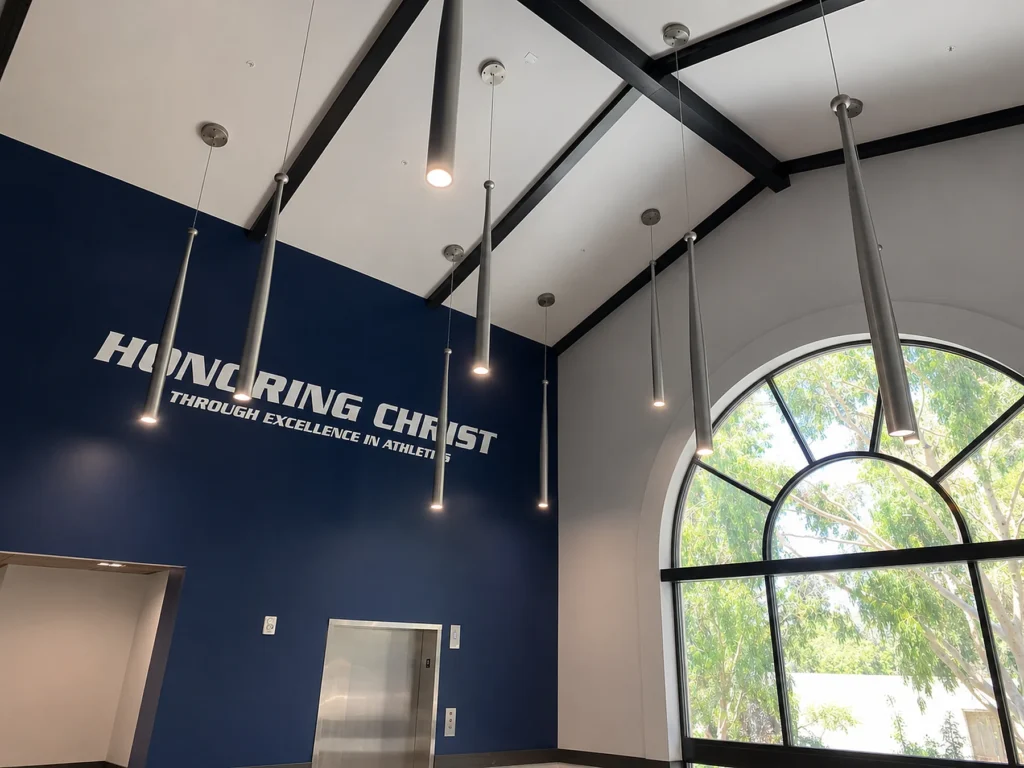 Custom baseball bat pendant lighting for California Baptist University at Riverside, CA, USA. Manufactured by Karice.