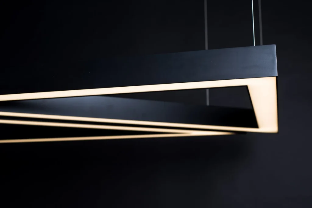 3-4-5 LED pendant with right-triangle form inspired by the Pythagorean theorem, sized at 3 ft by 4 ft by 5 ft. Designed and manufactured by Karice.