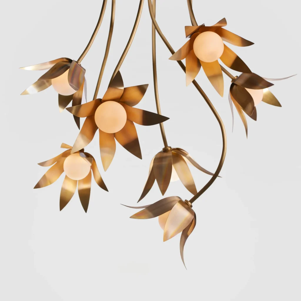 Bloom LED pendant with hand-blown glass and hand-formed brass petals, designed as a floral-inspired light fixture with dim-to-warm LED illumination. Designed and manufactured by Karice.