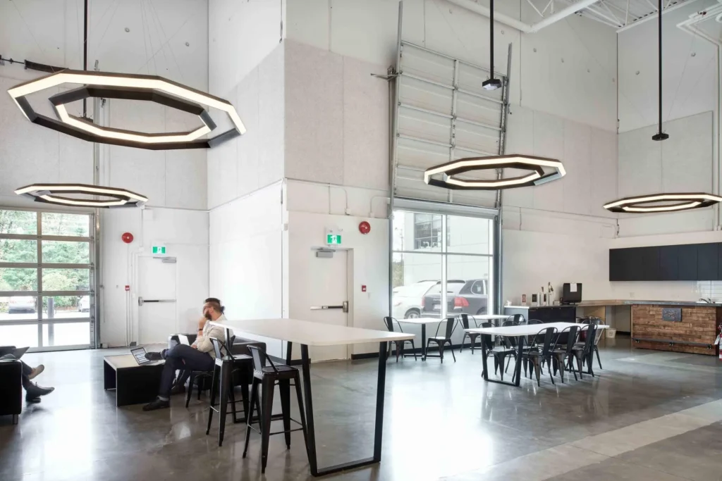 Luxennea Diamond sculptural chandelier with layered geometric tiers suspended by aircraft cables. Inspired by the Florentine Diamond. Designed and manufactured by Karice.