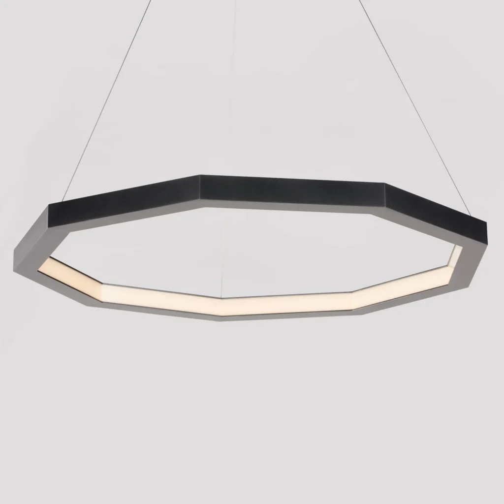 Luxennea Series 2 LED pendant with nine-sided geometric form, faceted aluminum construction, and inward diffused illumination. Designed and manufactured by Karice.