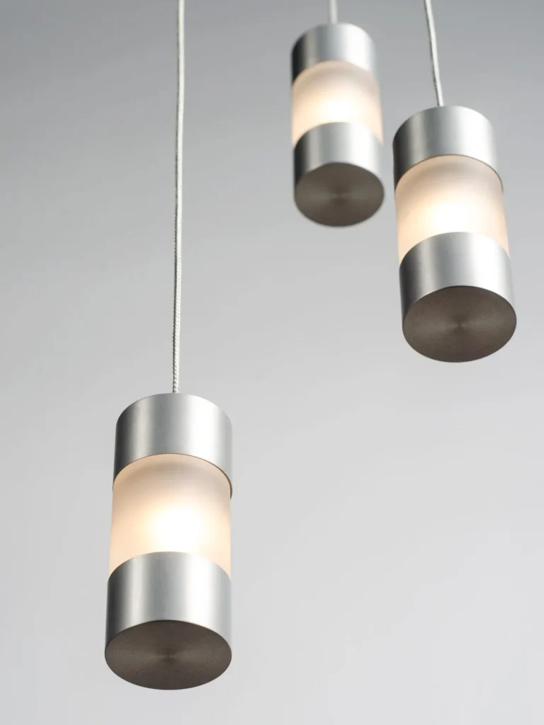 Mini Fuse LED pendant with flattened ends, acrylic diffuser, and minimalist automotive fuse-inspired design. Designed and manufactured by Karice.