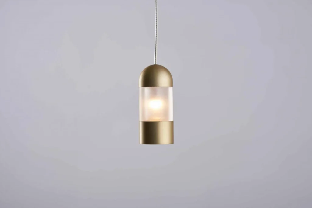 Mini Fuse LED pendant with flattened ends, acrylic diffuser, and minimalist automotive fuse-inspired design. Designed and manufactured by Karice.