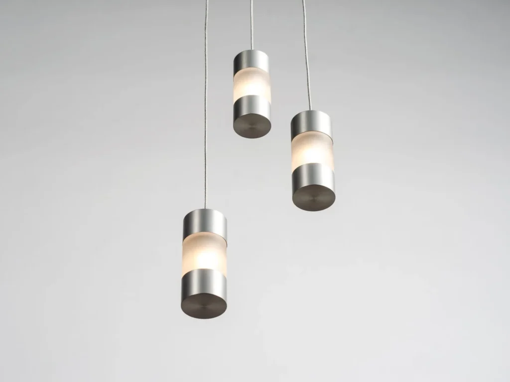 Mini Fuse LED pendant with flattened ends, acrylic diffuser, and minimalist automotive fuse-inspired design. Designed and manufactured by Karice.