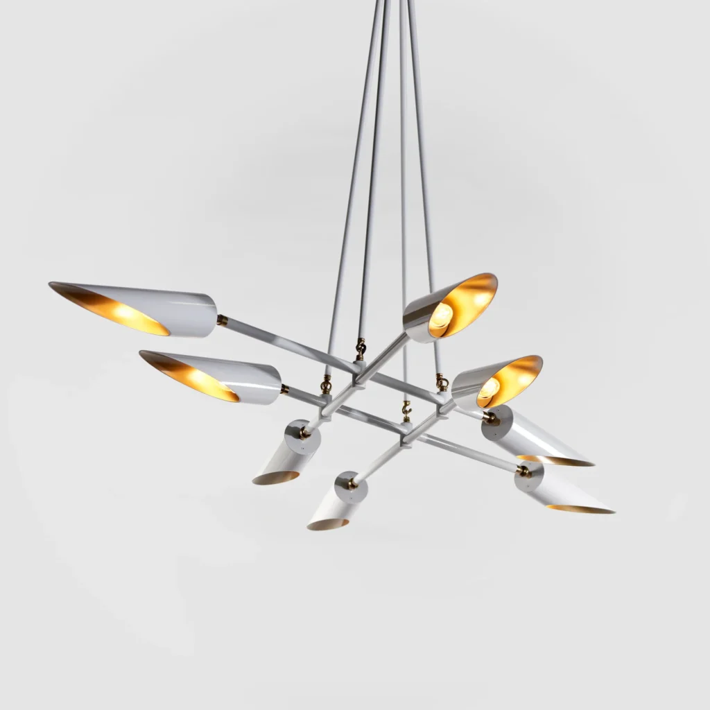 Octave mid-century chandelier with eight adjustable tilting shades, genuine brass swivels, and black or white finish options. Designed and manufactured by Karice.