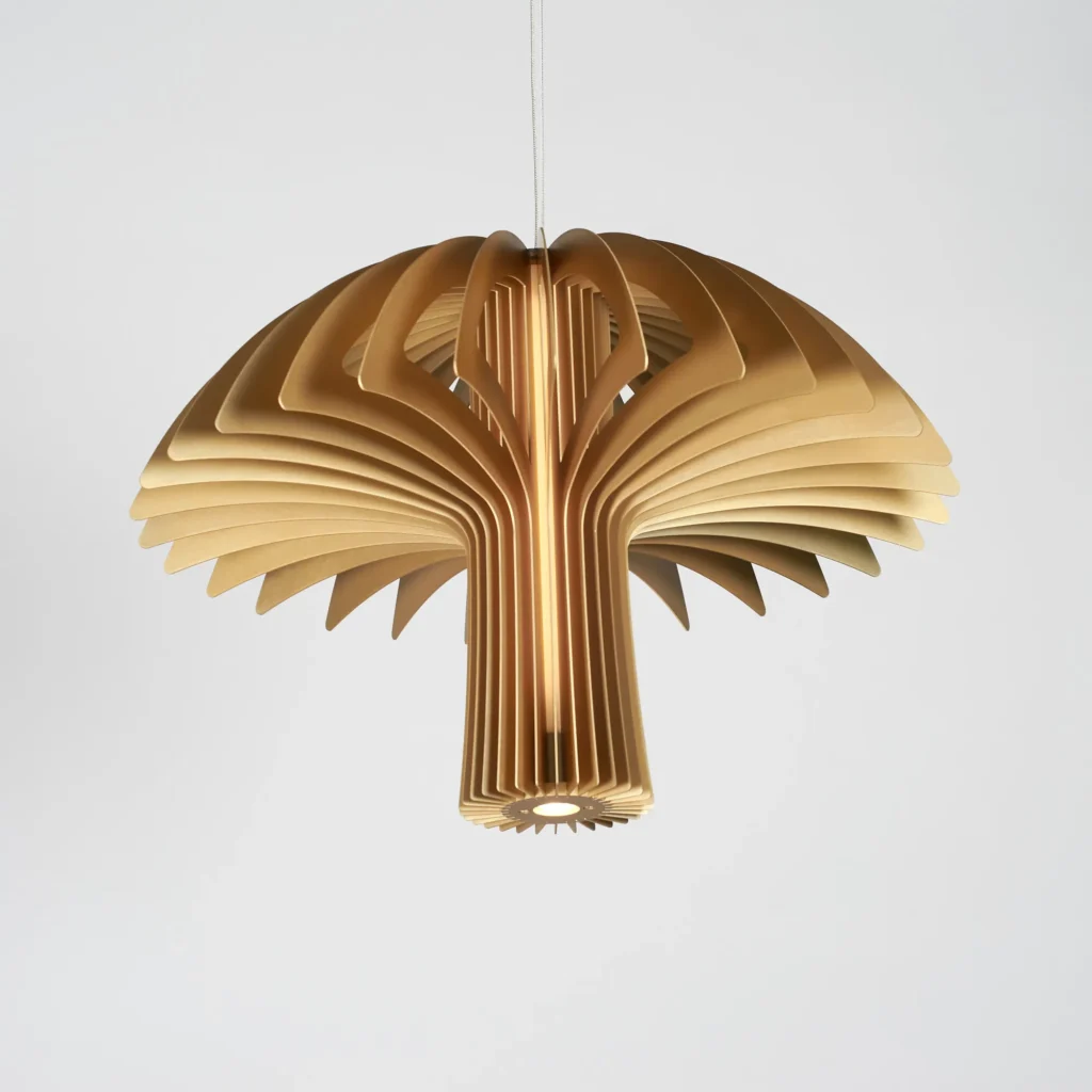 Shroom LED pendant light with mushroom-inspired form, aluminum blade construction, and illuminated acrylic core. Designed and manufactured by Karice.
