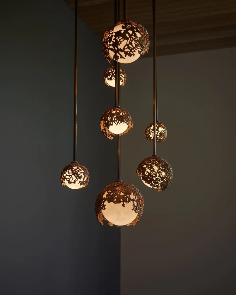 Spheres bronze sculptural light with hand-blown glass globes and dim-to-warm LED technology. Designed and manufactured by Karice, in collaboration with Marie Khouri.