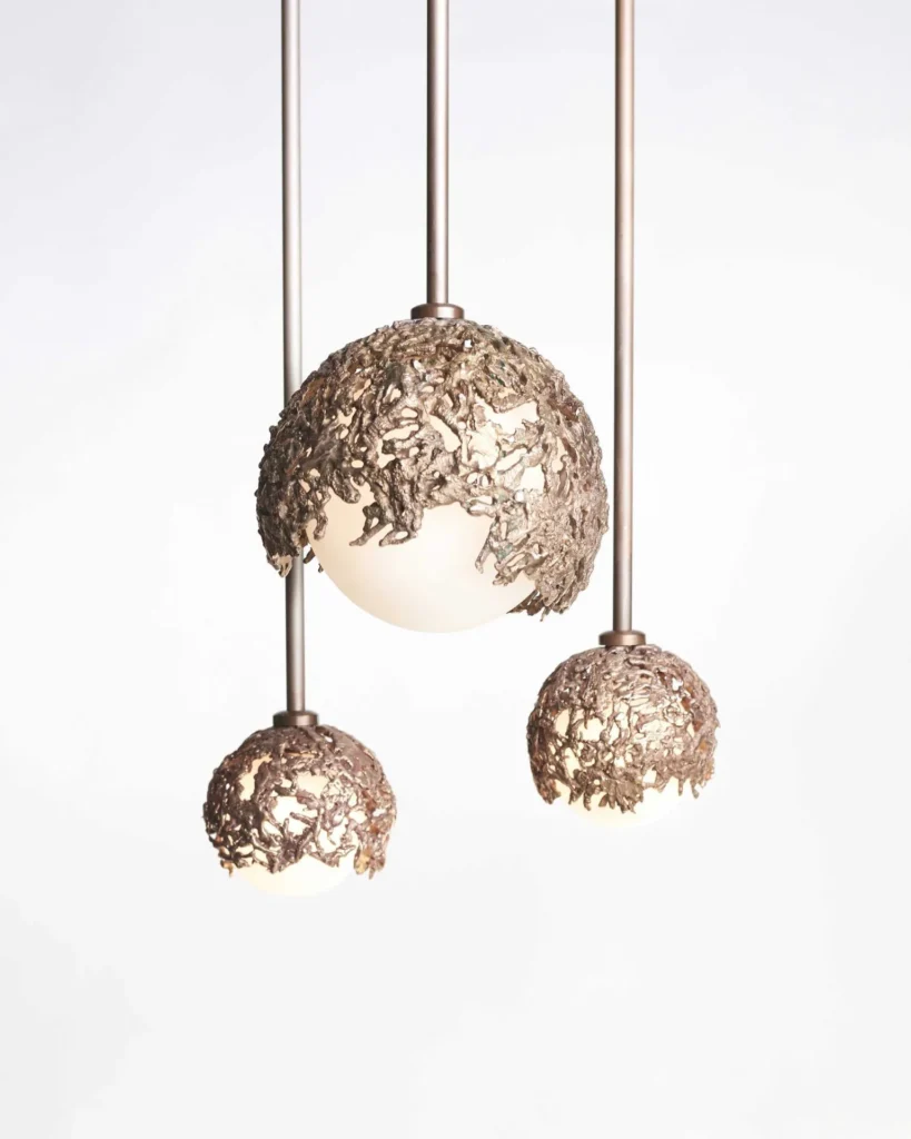 Spheres bronze sculptural light with hand-blown glass globes and dim-to-warm LED technology. Designed and manufactured by Karice, in collaboration with Marie Khouri.