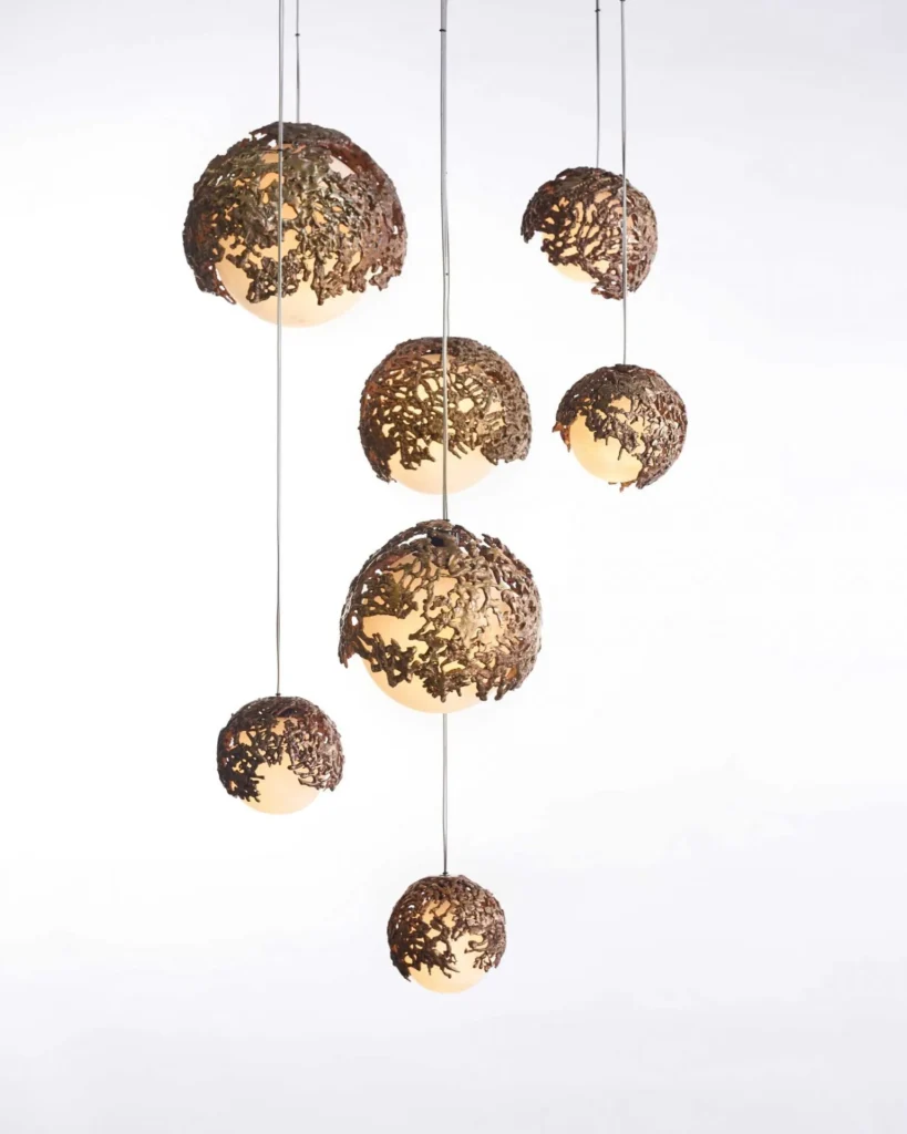Spheres bronze sculptural light with hand-blown glass globes and dim-to-warm LED technology. Designed and manufactured by Karice, in collaboration with Marie Khouri.
