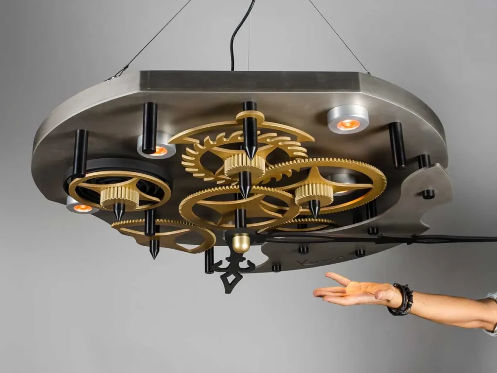 TIME sculptural LED light inspired by clockwork, featuring exposed gears, springs, pins, and ruby-like COB LED lights. Designed and manufactured by Karice.